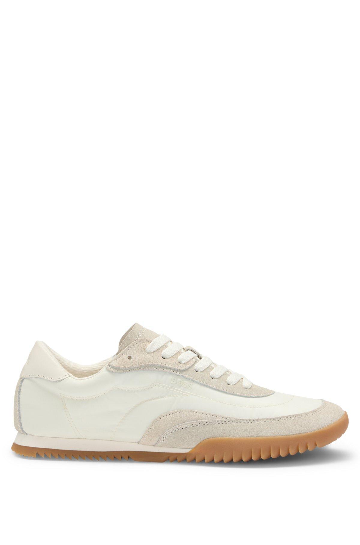 Low-top trainers in fabric and suede Product Image