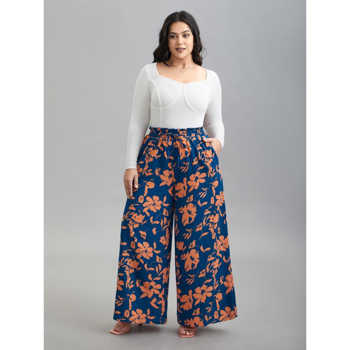 Plus Size Floral Smocked Waist Flared Leg Pants Women DarkBlue Elegant Wide Leg Mid Rise Everyday Pants BloomChic 12/L Product Image