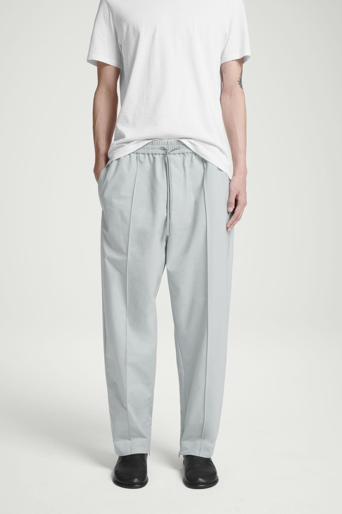 PINTUCKED TAPERED TRACK PANTS Product Image