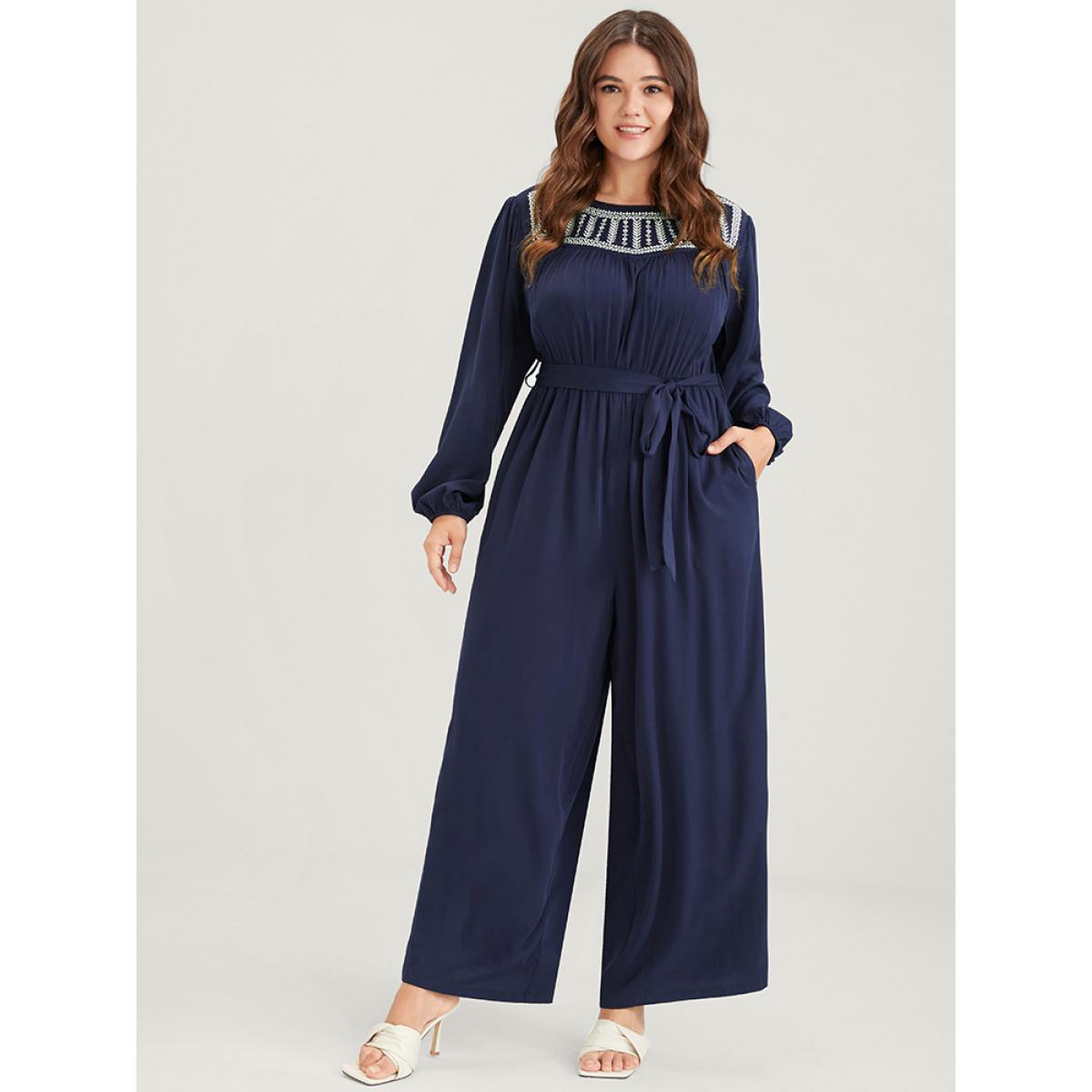 Plus Size DarkBlue Solid Pocket Lantern Sleeve Embroidered Belted Jumpsuit Women Elegant Long Sleeve Round Neck Dailywear Loose Jumpsuits BloomChic 12/L Product Image