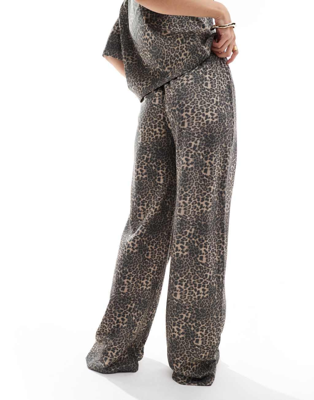 ASOS DESIGN wide leg pants in leopard Product Image