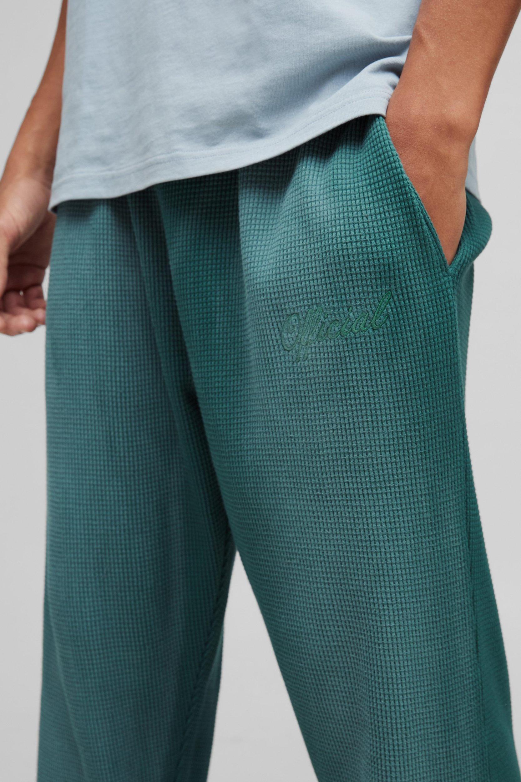 Regular Fit Spray Wash Heavy Waffle Embroidered Split Hem Sweatpants | boohooMAN USA Product Image