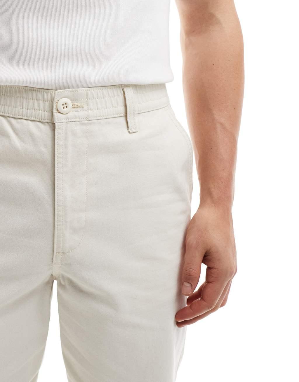 ASOS DESIGN baggy fit pants with workwear patch in ecru Product Image