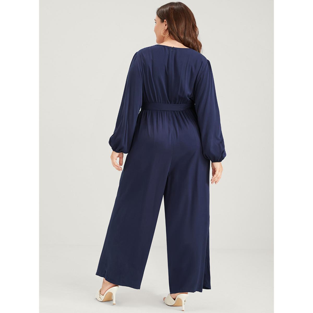 Plus Size DarkBlue Solid Pocket Lantern Sleeve Embroidered Belted Jumpsuit Women Elegant Long Sleeve Round Neck Dailywear Loose Jumpsuits BloomChic 12/L Product Image