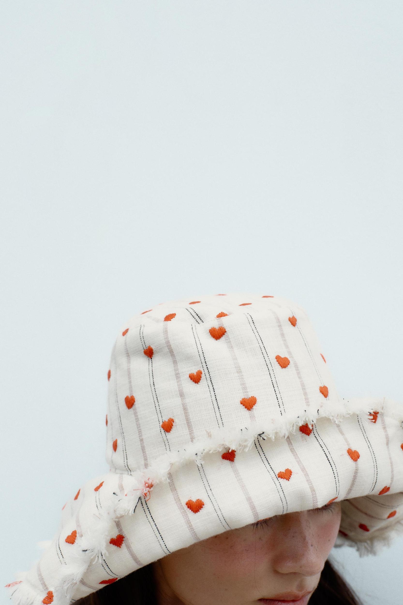 STRIPED HEART EMBROIDERED BUCKET HAT Product Image