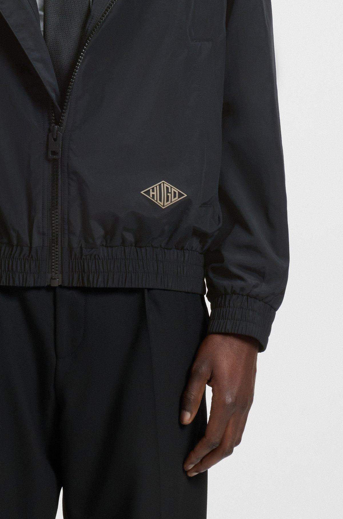 Hooded windbreaker jacket with mesh lining Product Image