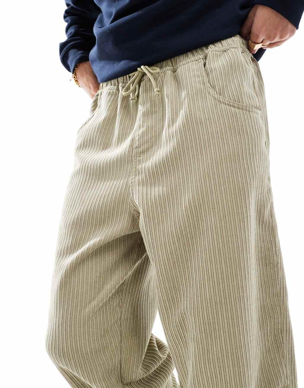 ASOS DESIGN tapered cord pants in beige  Product Image