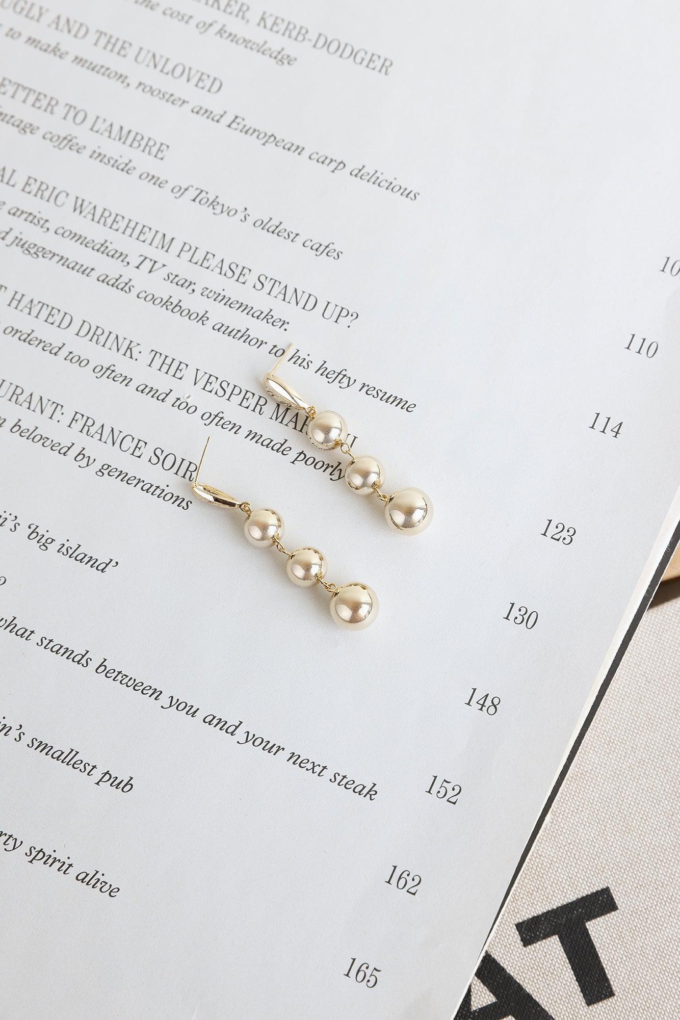 Flirty Fun Earrings Gold Product Image