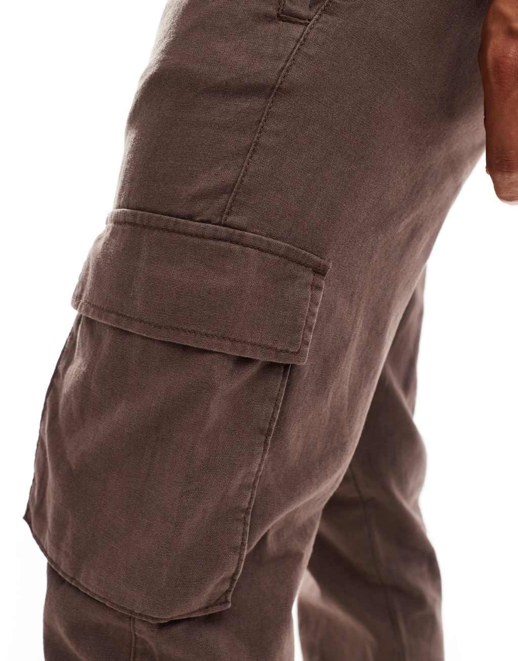 ASOS DESIGN tapered pull on linen mix cargo pants in washed brown Product Image