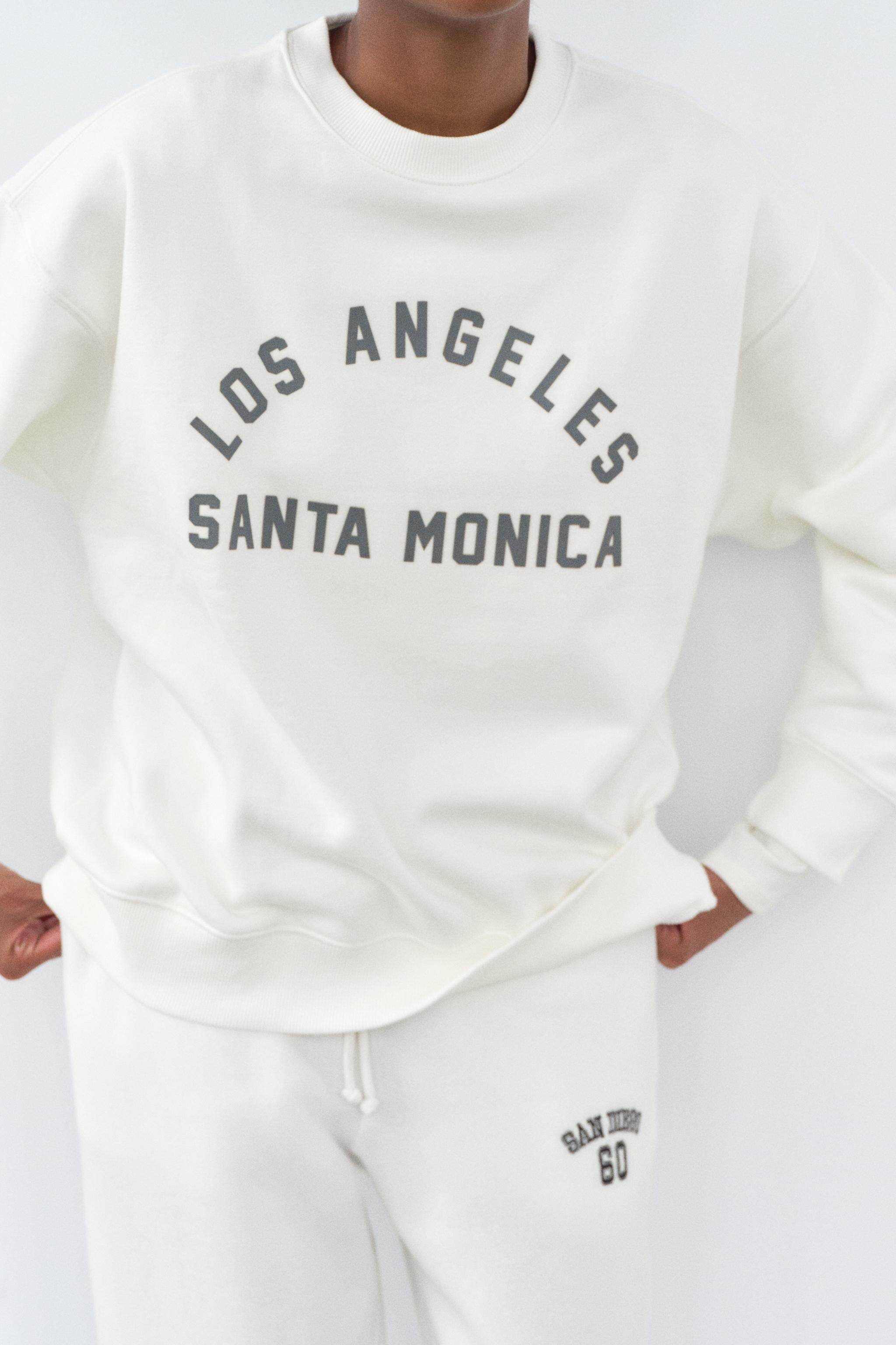 WASHED EFFECT RUBBERIZED TEXT SWEATSHIRT Product Image
