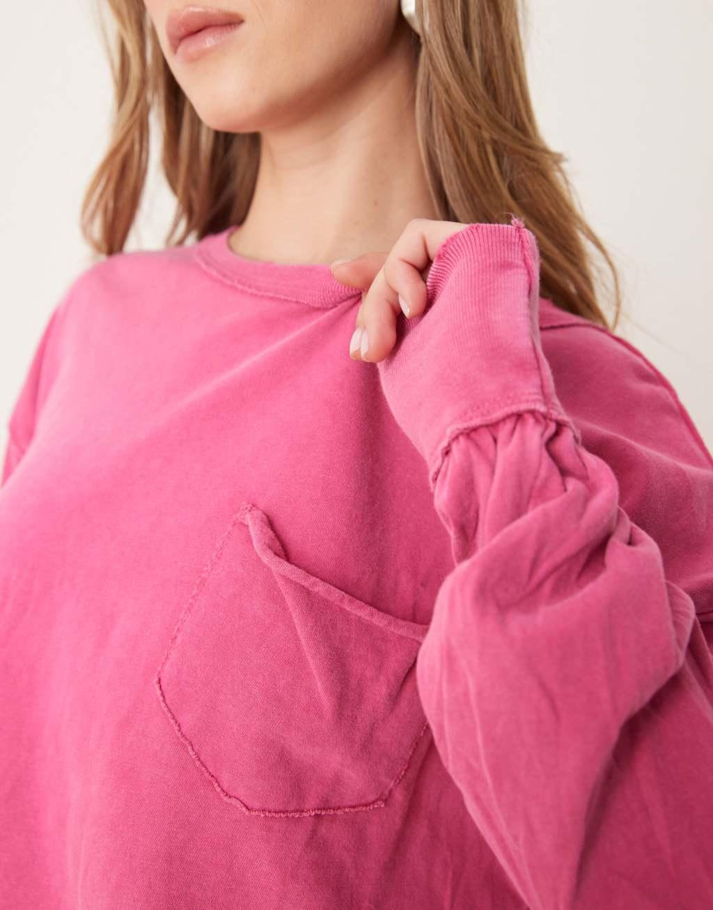 Free People fade into you relaxed long sleeve top in pink Product Image
