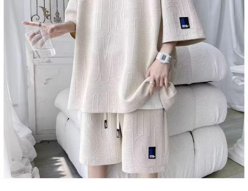 Set: Elbow-Sleeve Crew Neck Lettering Embossed Applique T-Shirt + Drawstring Waist Sweat Shorts Product Image