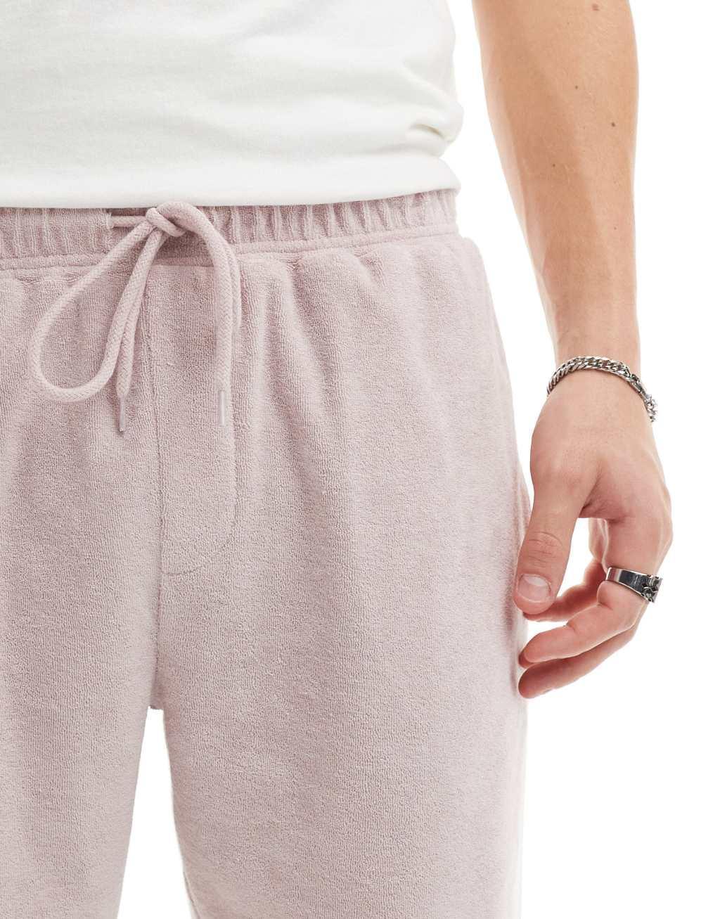 ASOS DESIGN slim terrycloth shorts in lilac Product Image