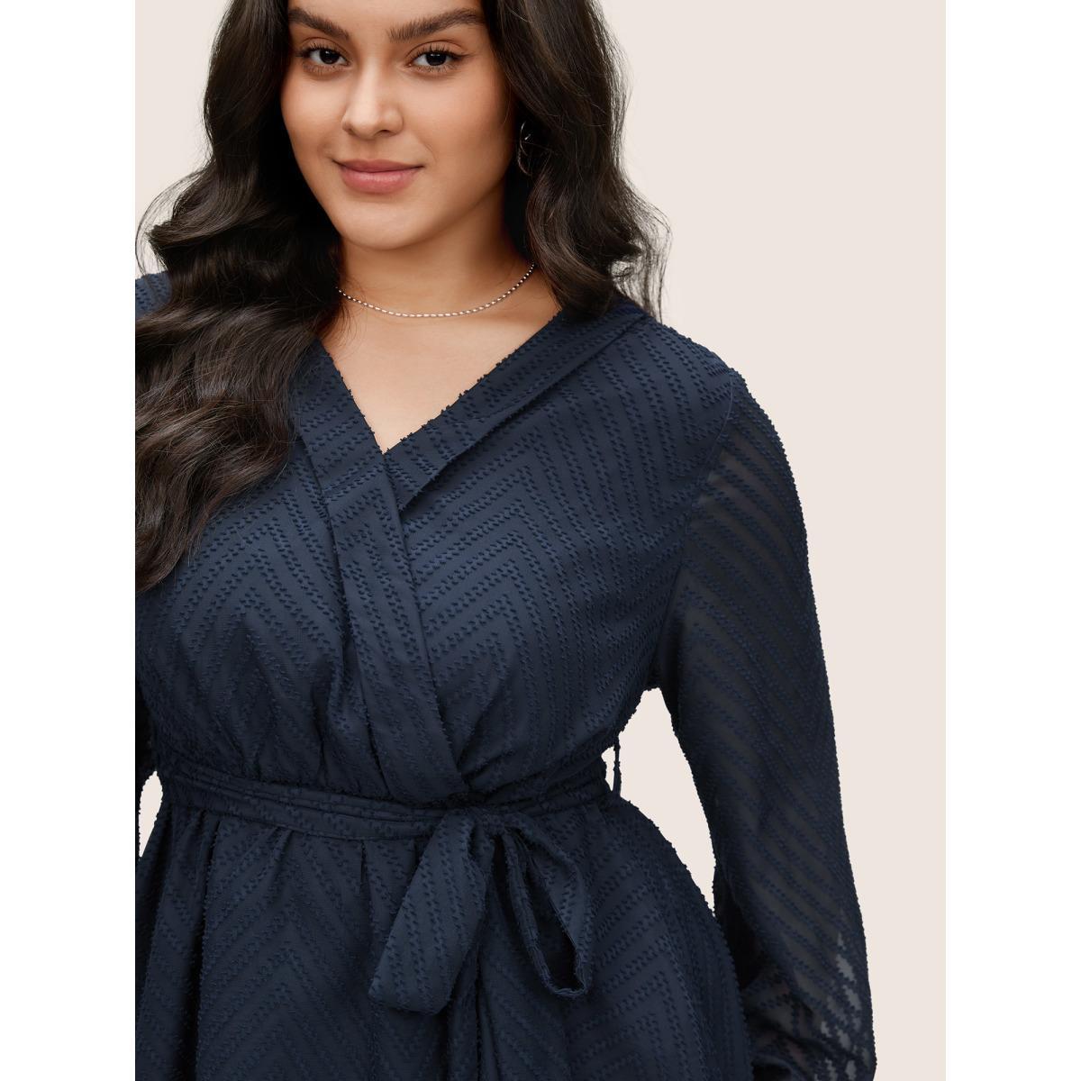 Plus Size Indigo Plain Textured High Low Hem Ties Blouse Women Office Long Sleeve Overlap Collar Work Blouses BloomChic 12/L Product Image