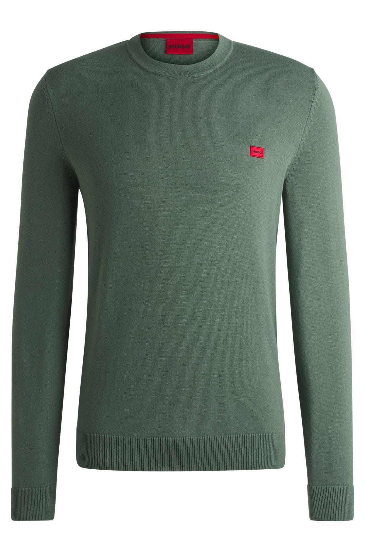 Knitted cotton sweater with red logo label Product Image