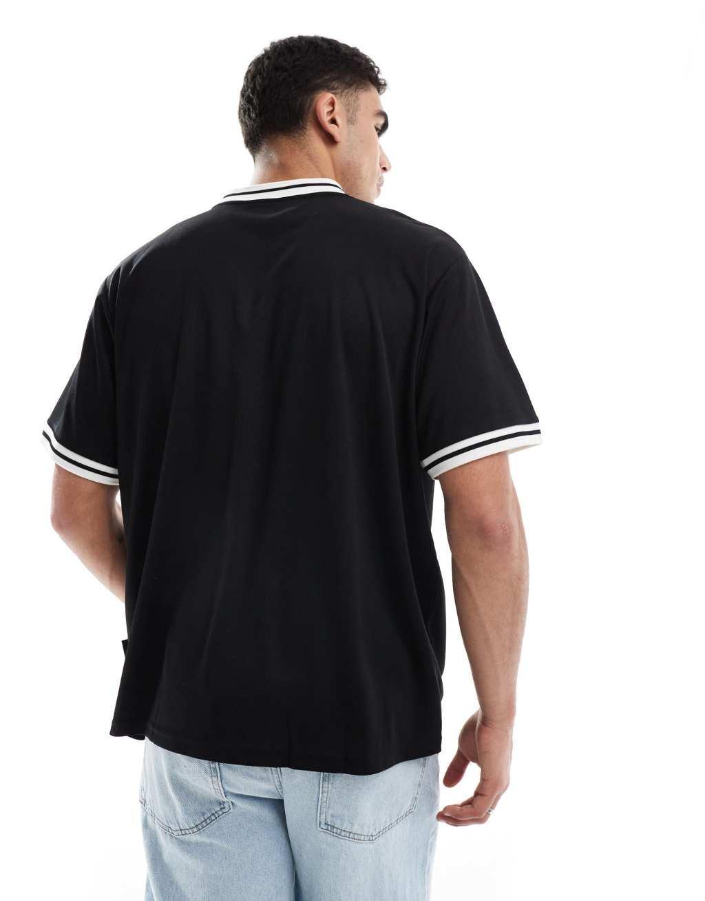 Jack & Jones soccer inspired top in black Product Image