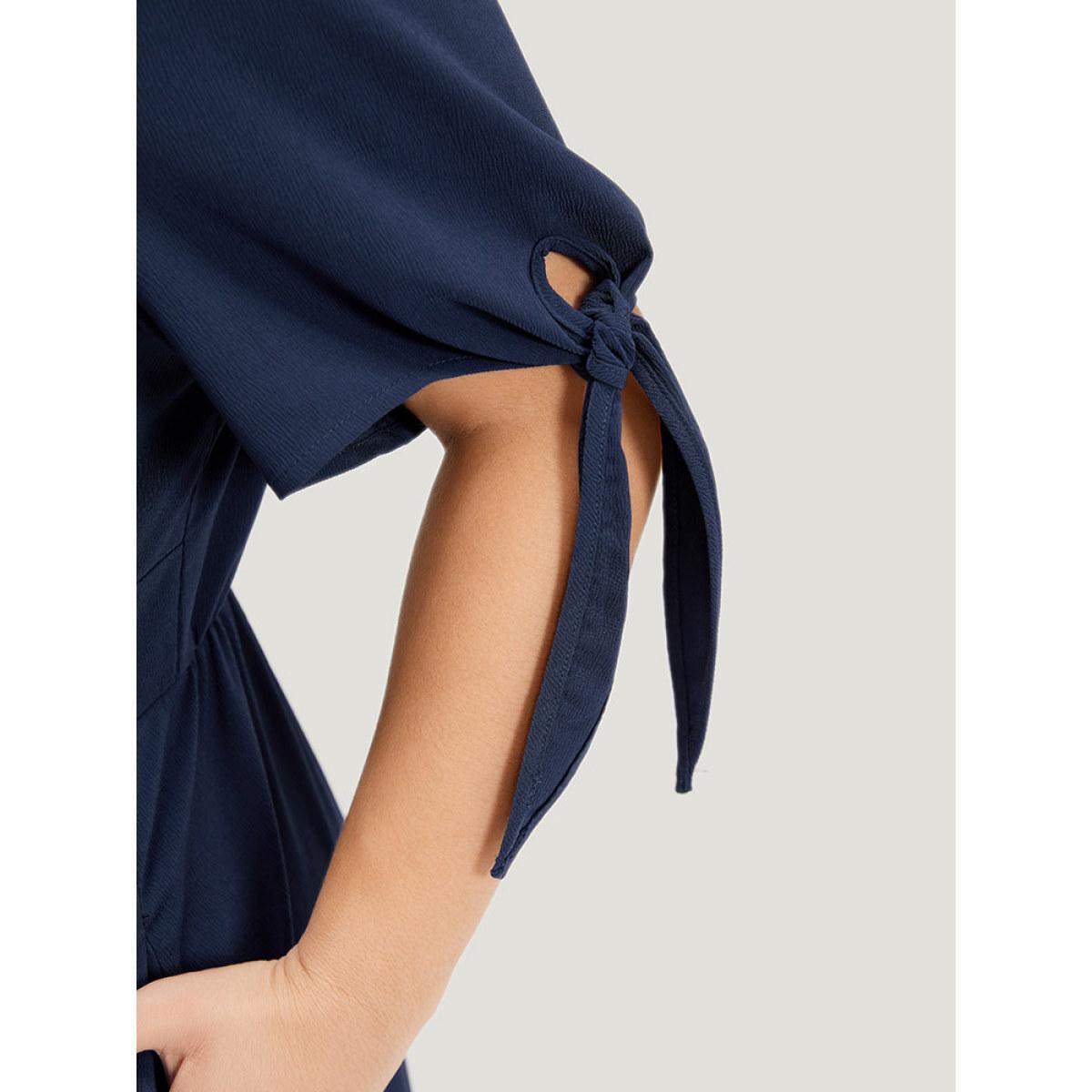 Plus Size Plain Pocket Button Detail V Neck Plicated Knot Dress Indigo Women Elegant Plain V-neck Short sleeve Curvy Midi Dress BloomChic 30/6X Product Image
