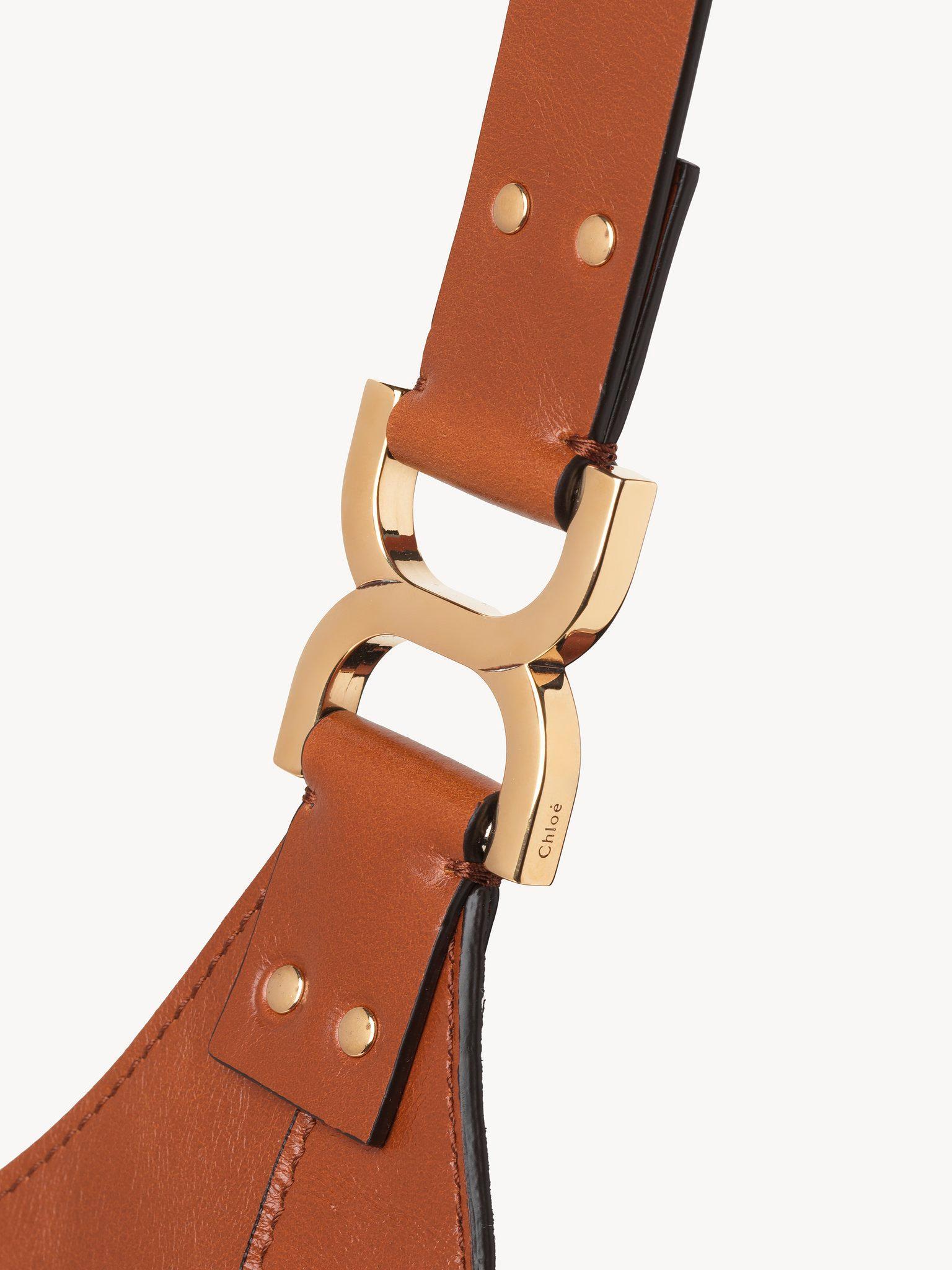 Small Marcie hobo bag in shiny leather Product Image