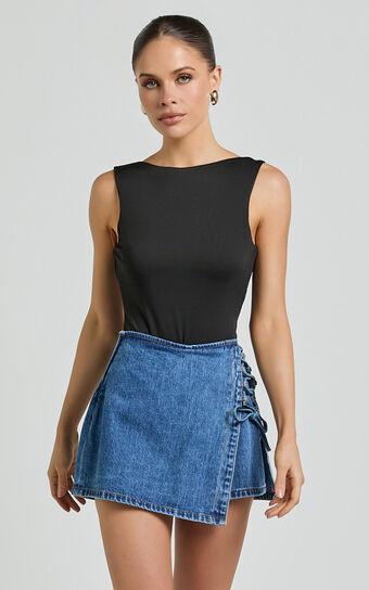 Ronnie Skort - Mid Waist Lace Up Denim Skort in Dark Blue Wash Product Image