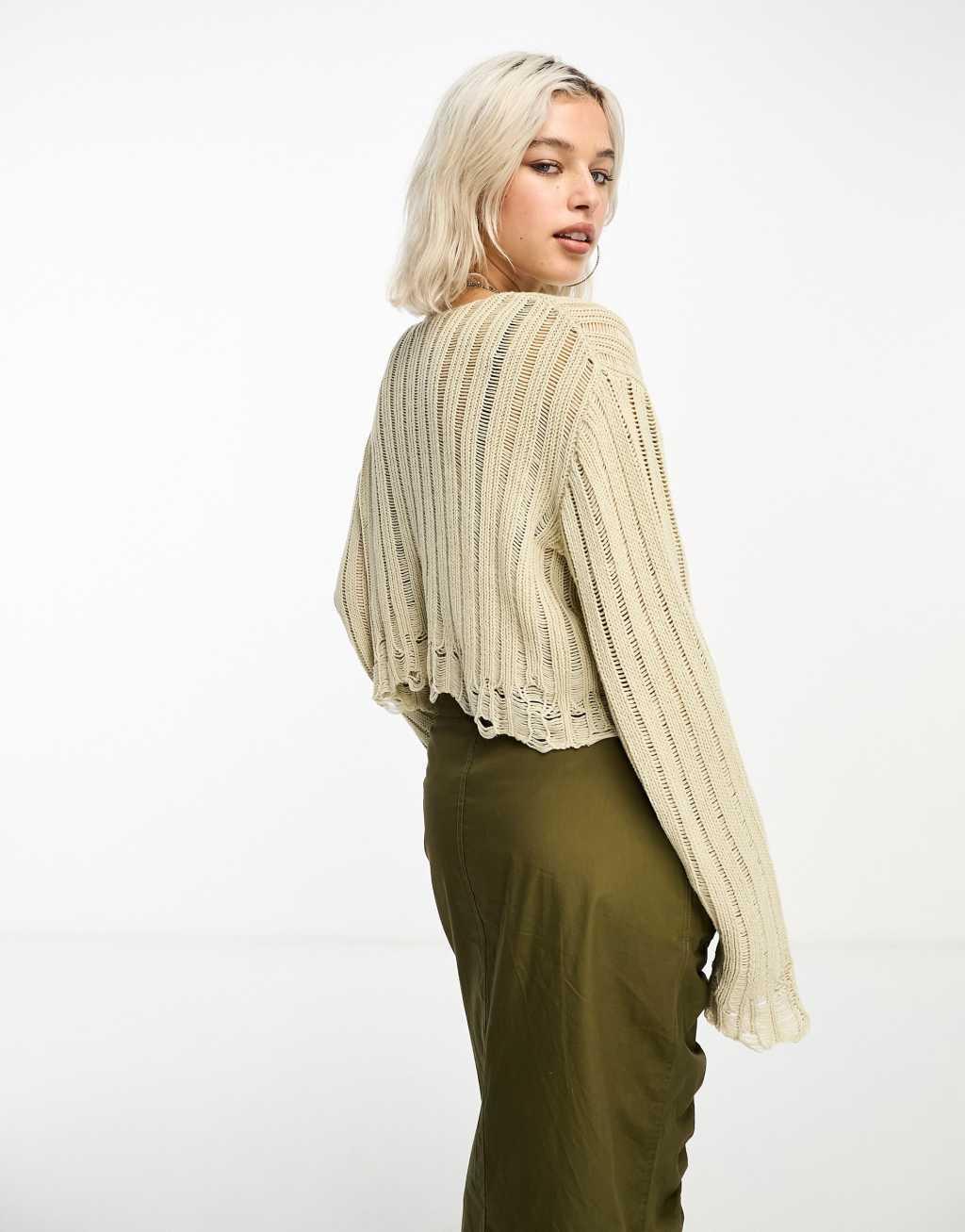 COLLUSION cropped distressed nibbled hem sweater Product Image