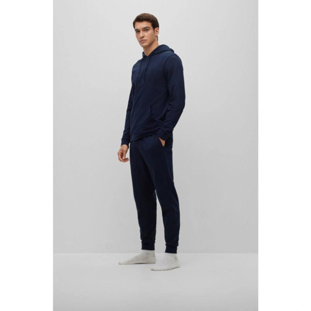 HUGO BOSS Cotton-terry Loungewear Tracksuit Bottoms With Embossed Logo In Blue Product Image
