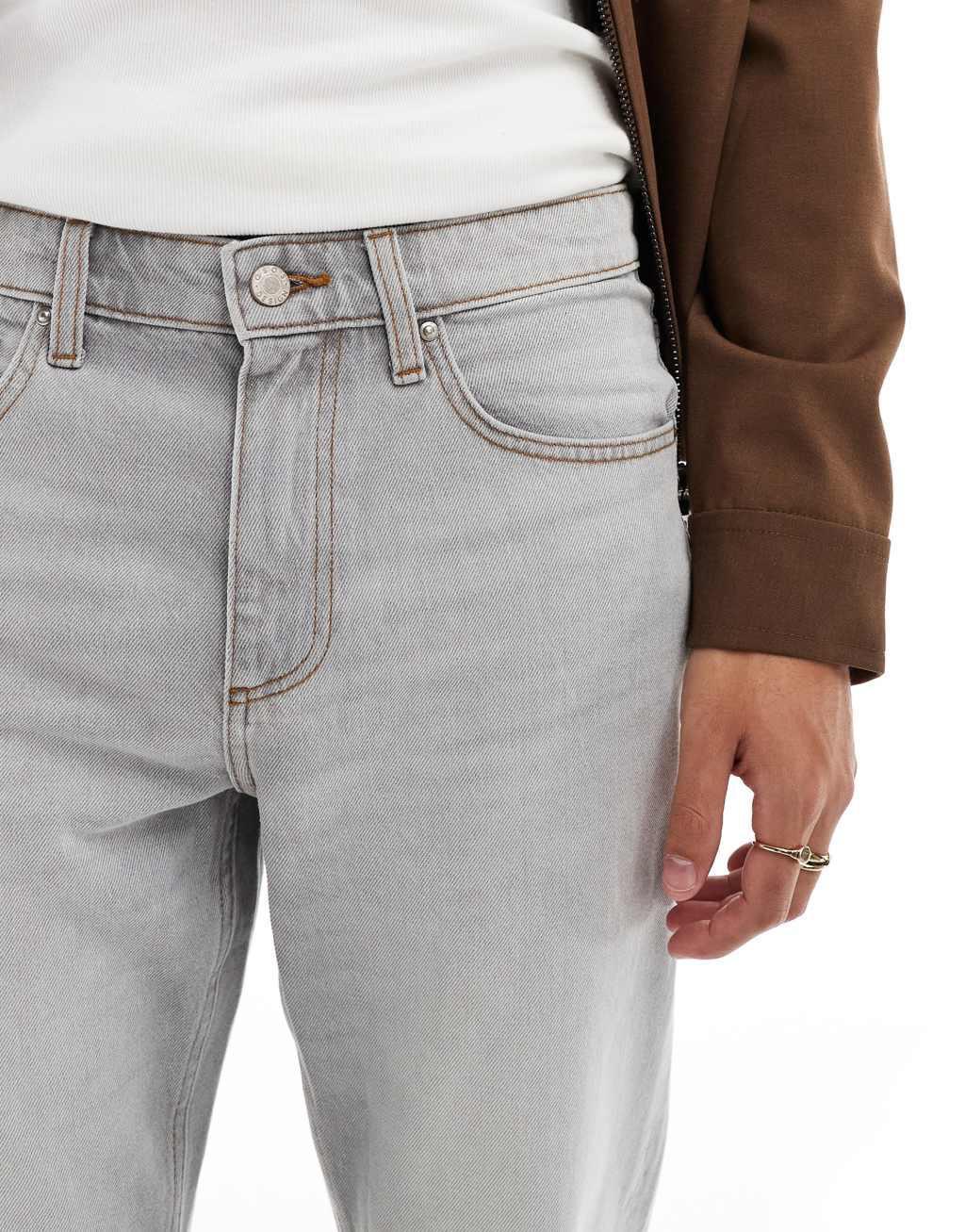 ASOS DESIGN tapered fit jeans in light gray Product Image