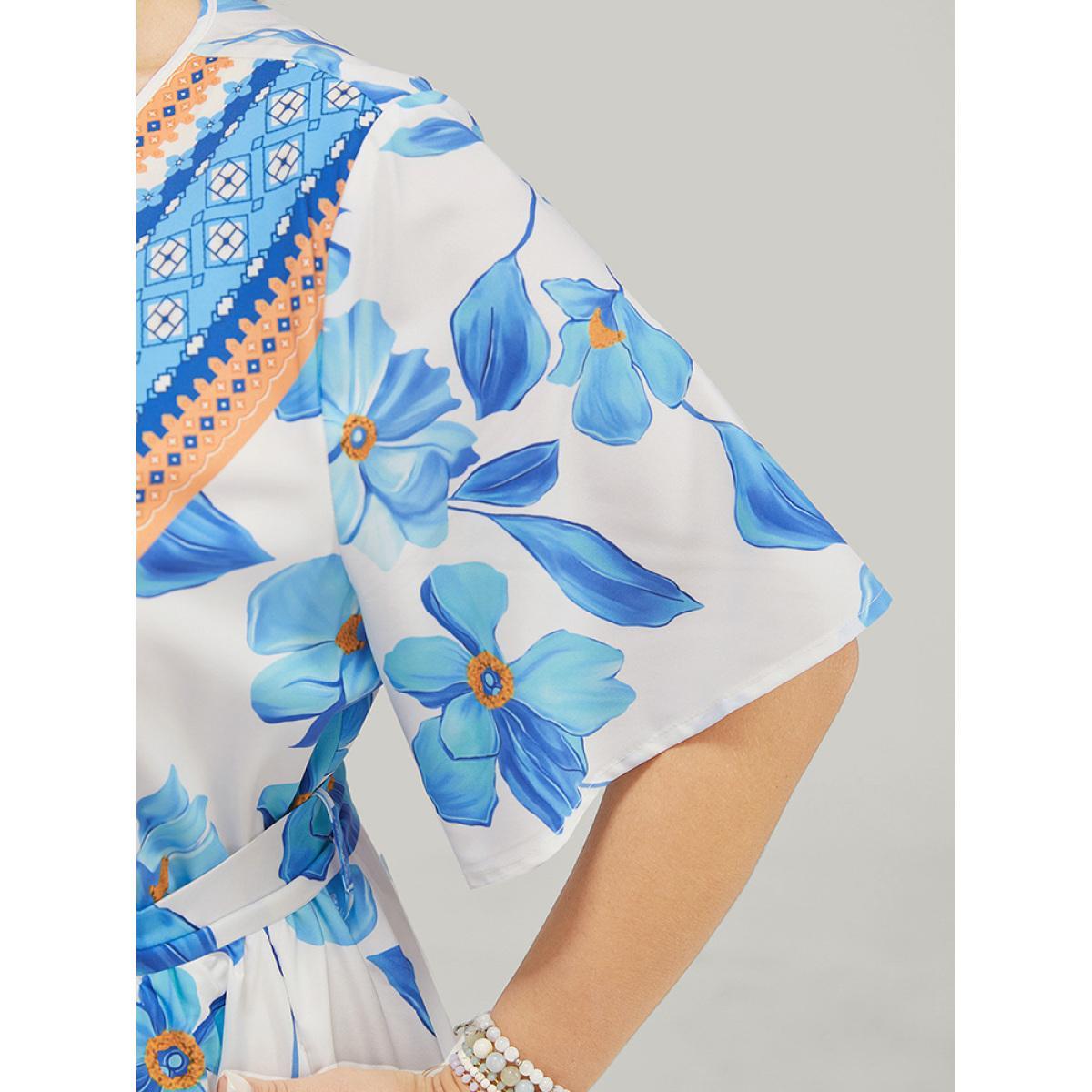 Plus Size Bandana Print Ruffle Hem Belted Pocket Wrap Dress LightBlue Women Vacation Cross straps V-neck Short sleeve Curvy Knee Dress BloomChic 30/6X Product Image