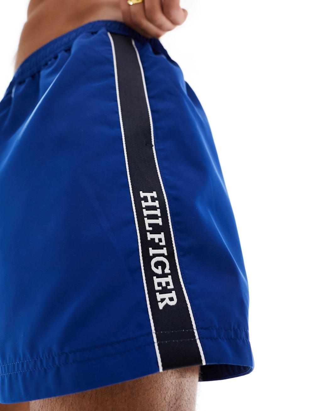 Tommy Hilfiger monotype medium drawstring tape swim shorts in blue Product Image