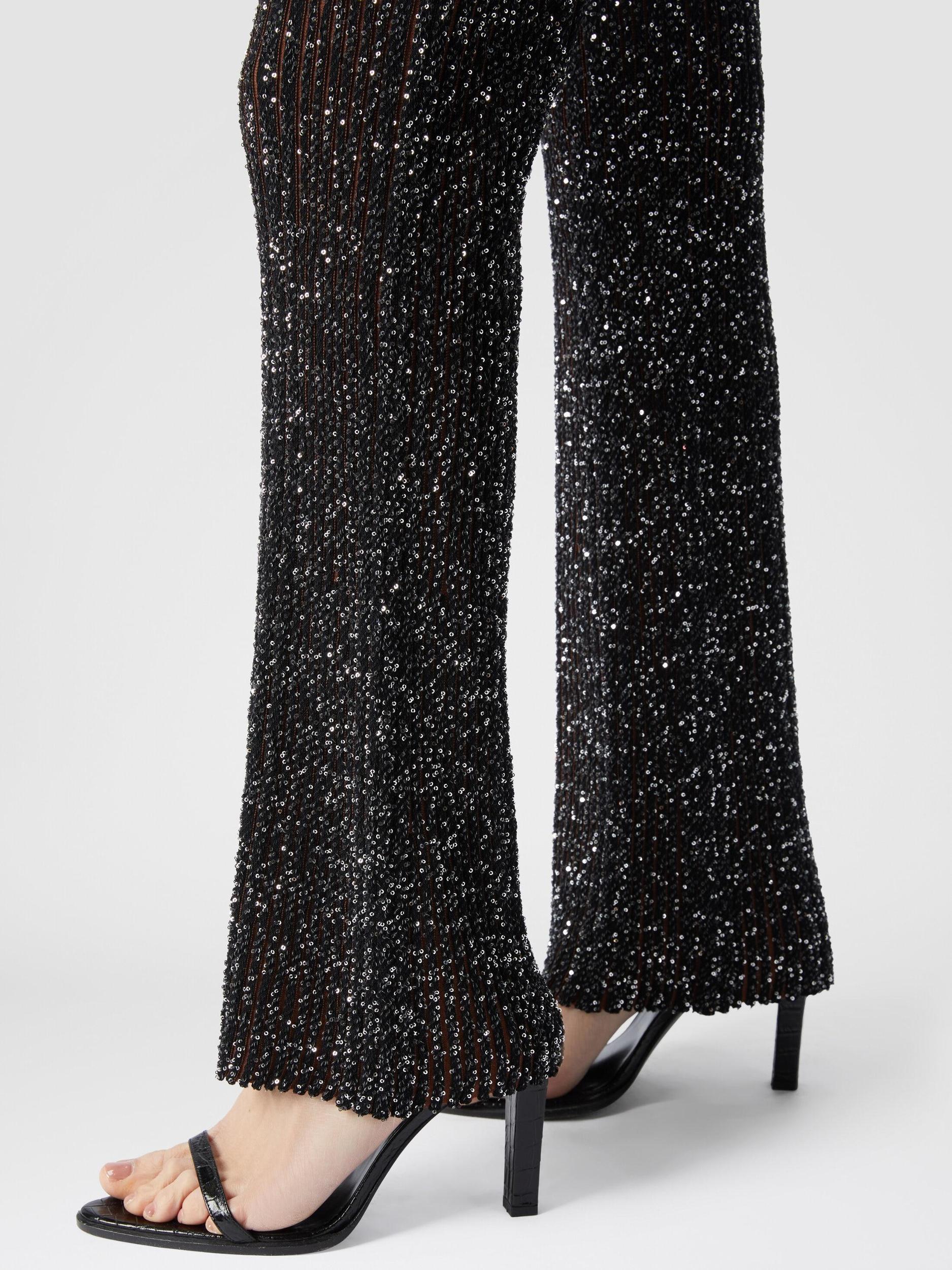 Ribbed stretch flared trousers with sequins Product Image