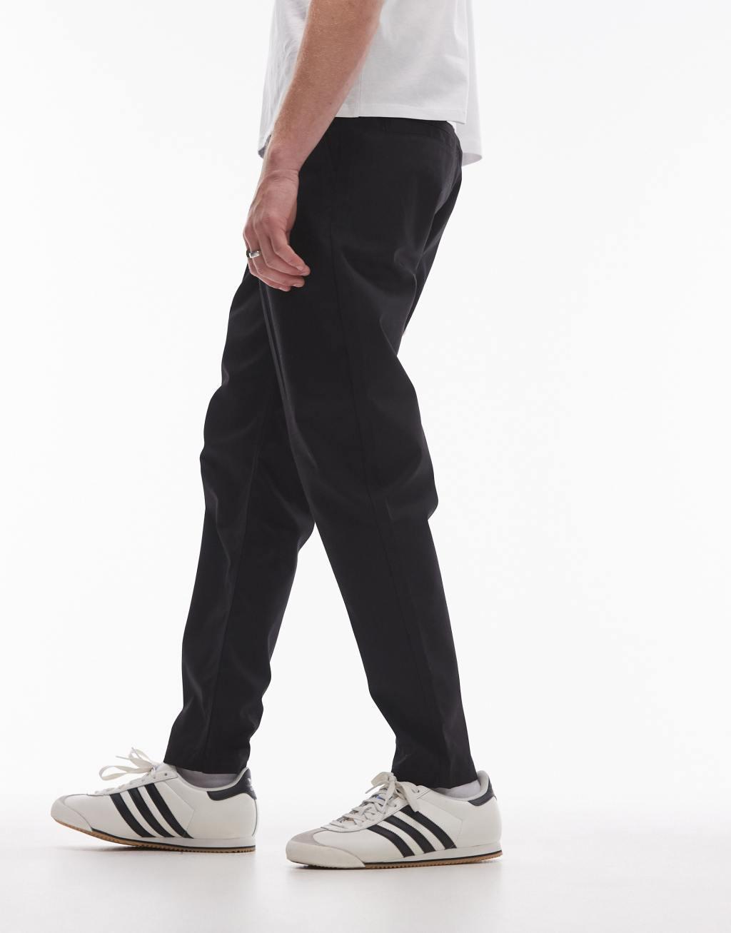 Topman twin pleated tapered pants in black Product Image