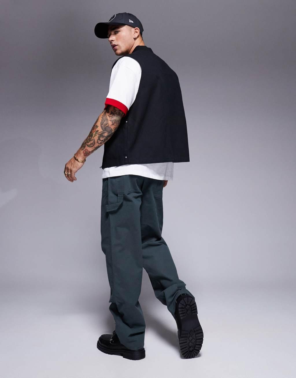 ASOS DESIGN baggy fit chino pants with carpenter detail in khaki Product Image