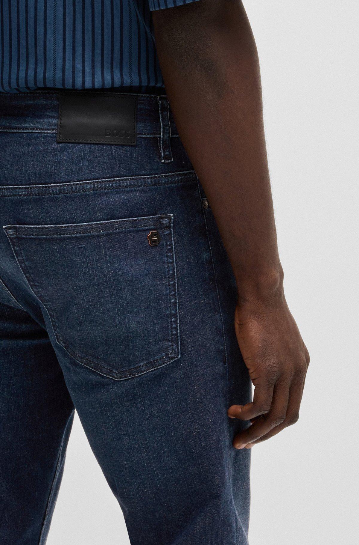 Delaware slim-fit jeans in dark-blue denim Product Image