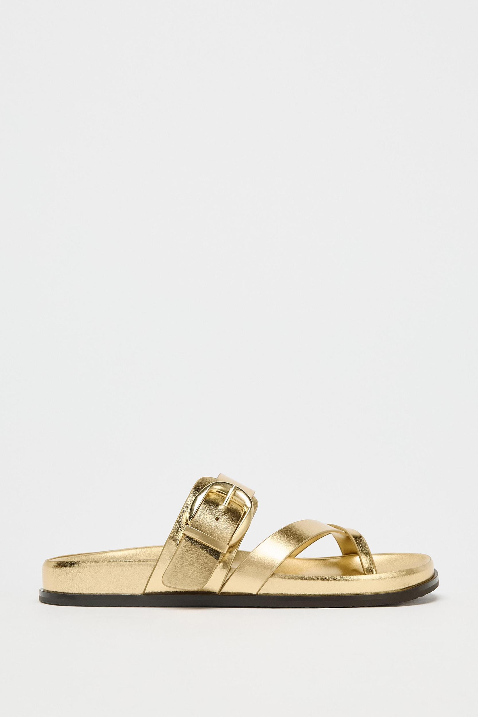 METALLIC EFFECT CROSSED STRAP SANDALS Product Image