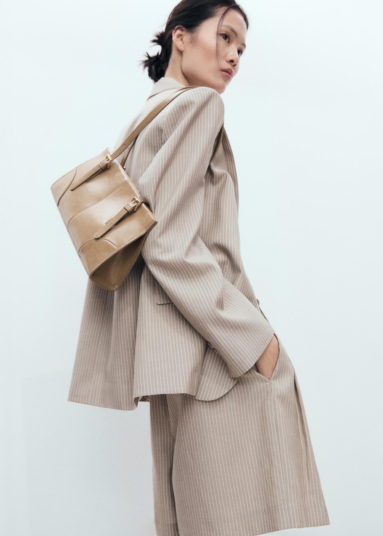 Shoulder bag with buckles - Women | MANGO USA Product Image