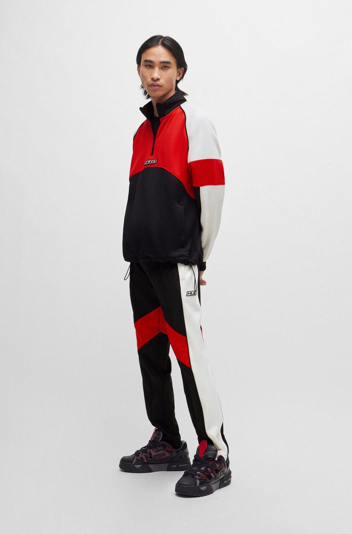 Color-blocked sweatshirt with racing-inspired logo badge Product Image