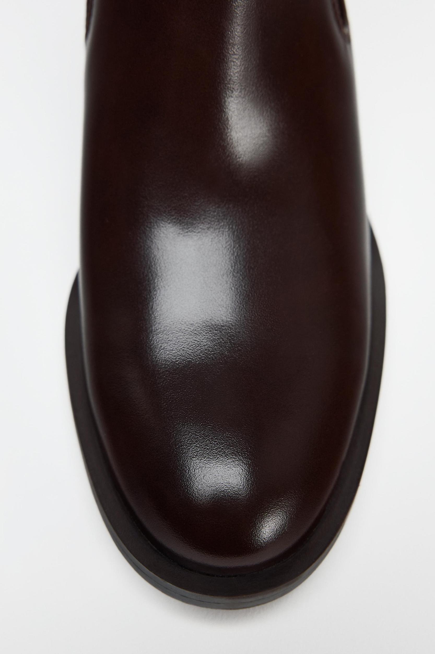 BUCKLED CHELSEA ANKLE BOOTS Product Image