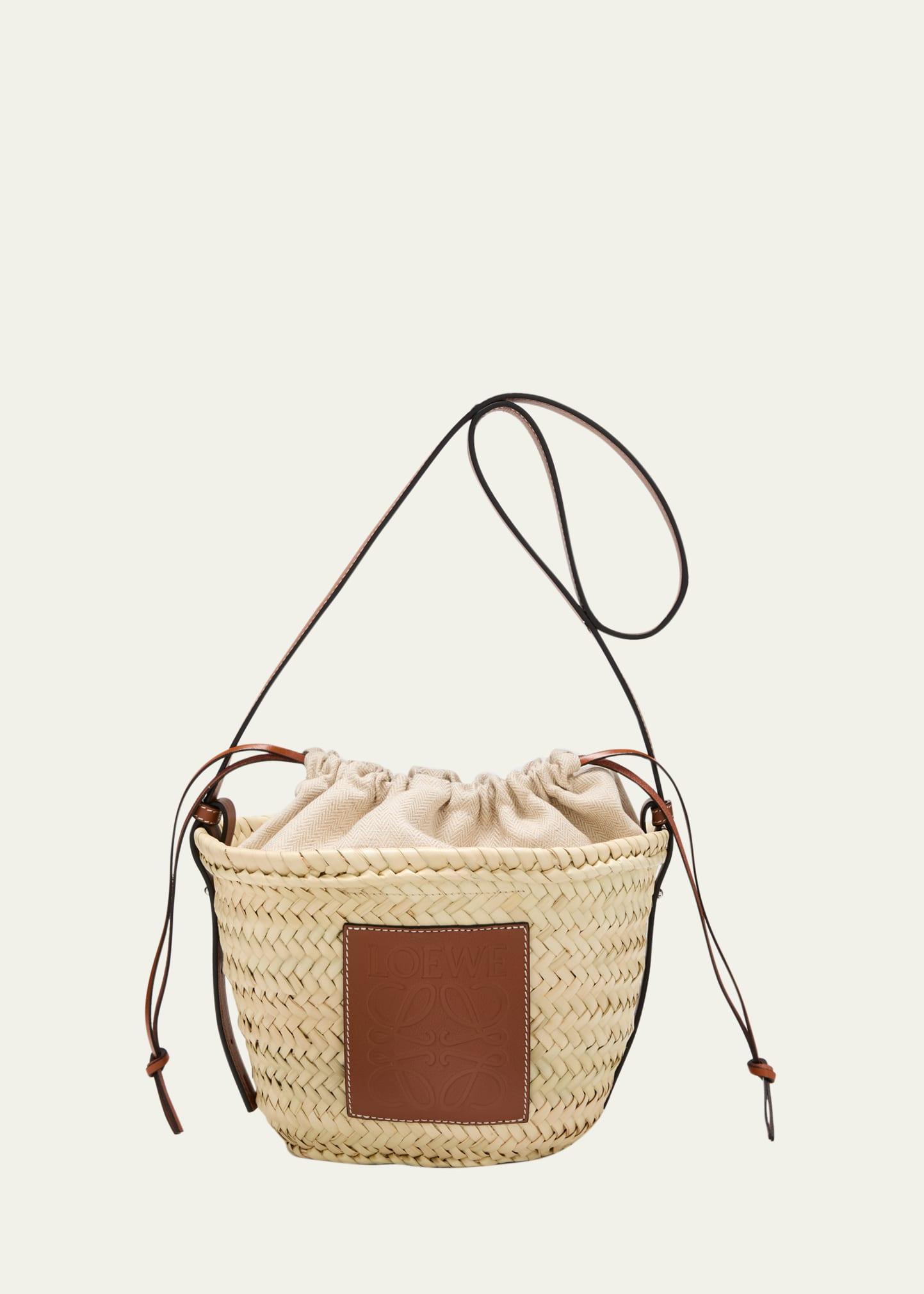 x Paulas Ibiza Basket Bucket Bag in Palm Leaf with Drawstring Pouch and Leather Strap Product Image