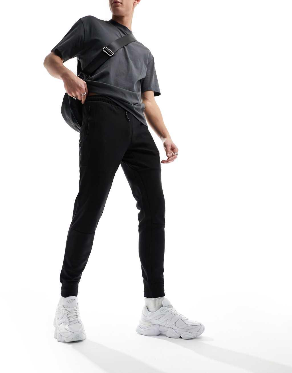 Jack & Jones tech sweatpants in black  Product Image