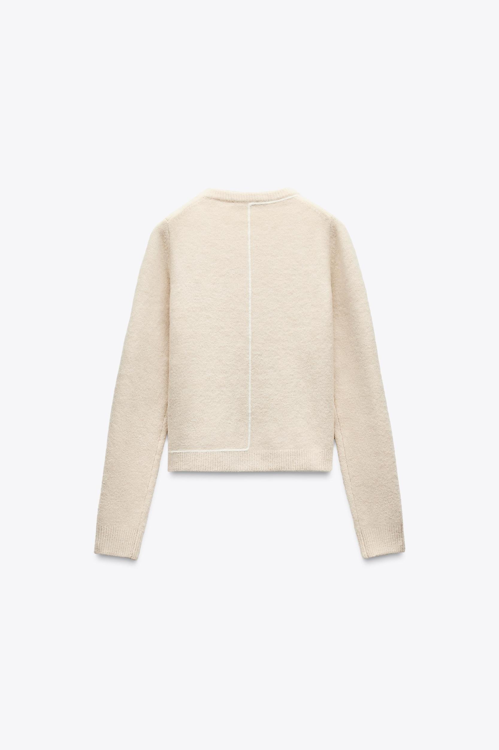 KNIT SWEATER WITH CONTRASTING PIPING Product Image