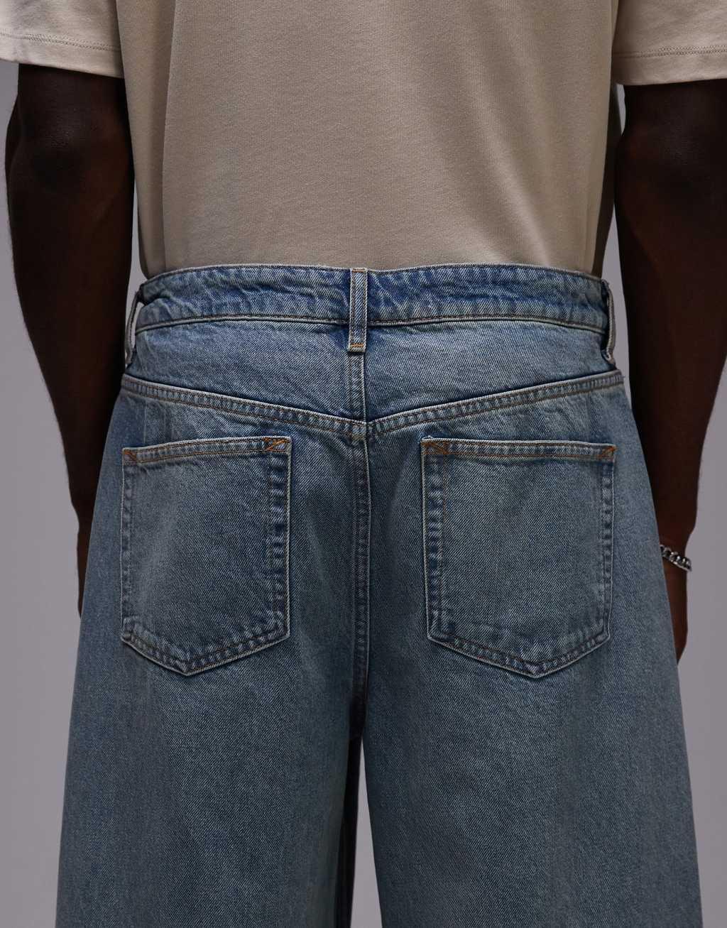 Topman baggy jeans in vintage mid wash Product Image