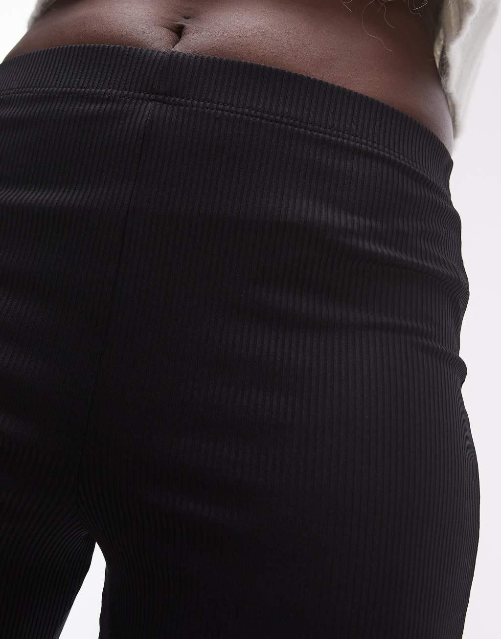 Topshop Tall skinny ribbed flared pants in black Product Image