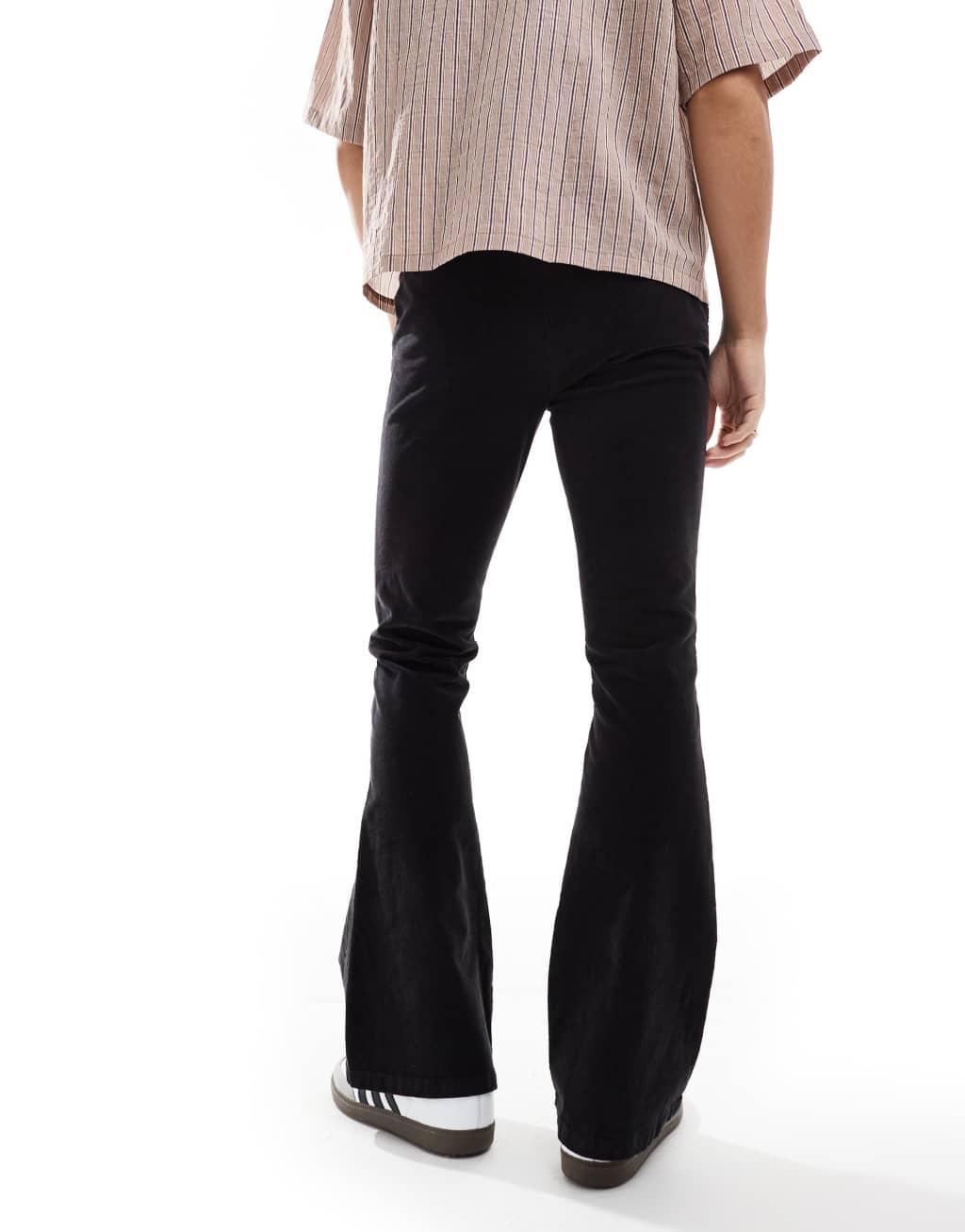 ASOS DESIGN flared corduroy pants in black Product Image