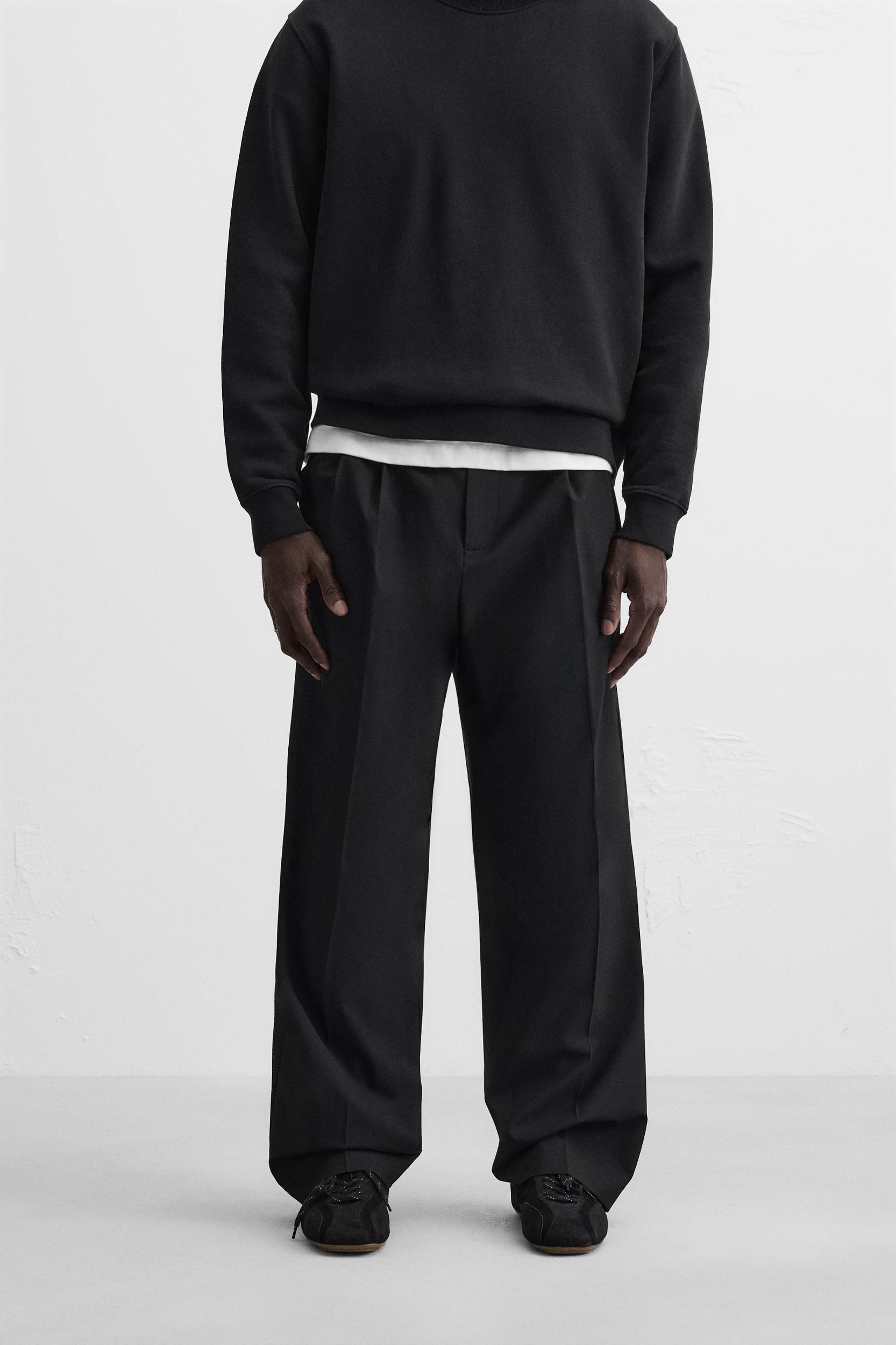 PLEATED WIDE FIT PANTS Product Image
