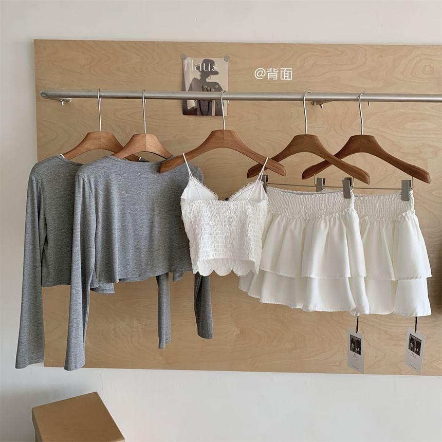 Set: V-Neck Lace Trim Camisole Top + Plain Cardigan + High Waist Plain Tiered Mini A-Line Skirt Product Image