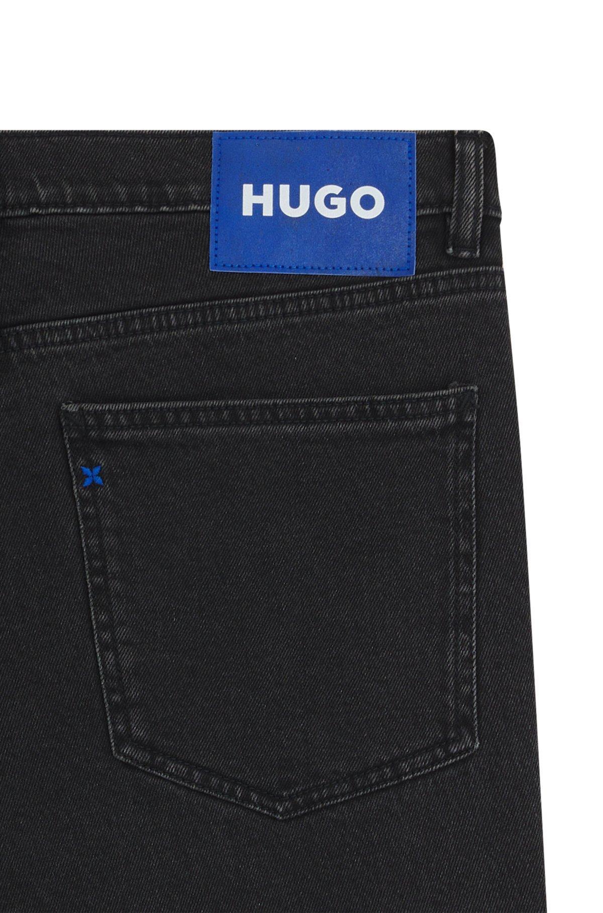Skinny-fit jeans in washed black denim Product Image