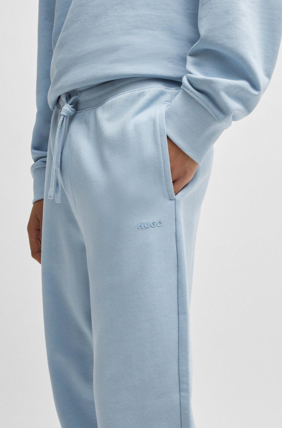Cotton-terry tracksuit bottoms with logo print Product Image