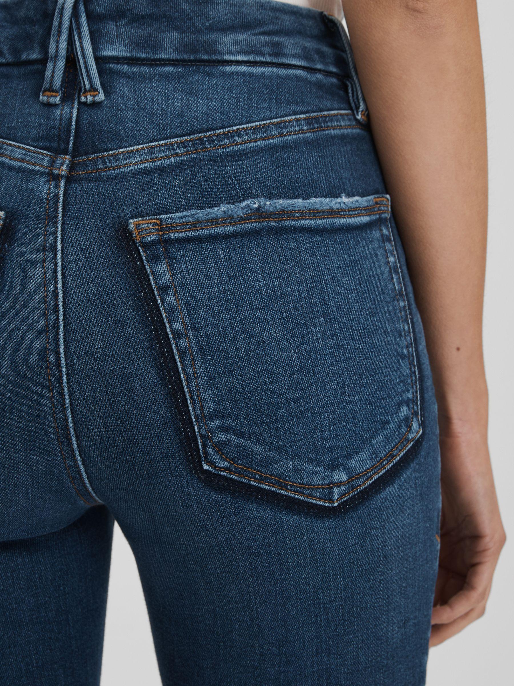 Good American Distressed Skinny Jeans in Indigo Product Image