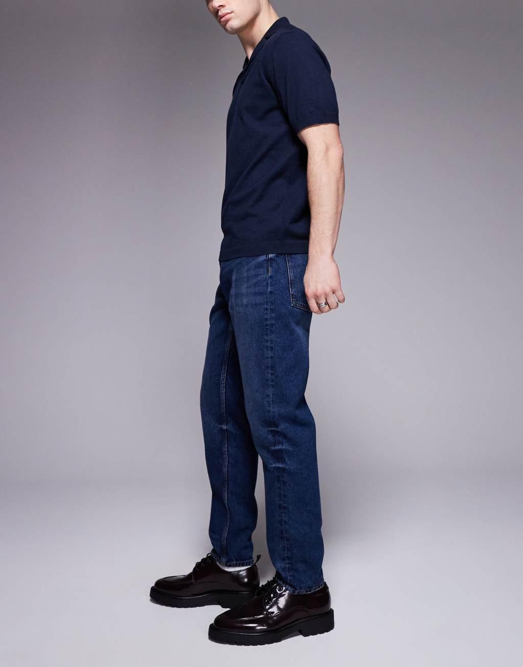 ASOS DESIGN tapered jeans in vintage dark wash blue Product Image