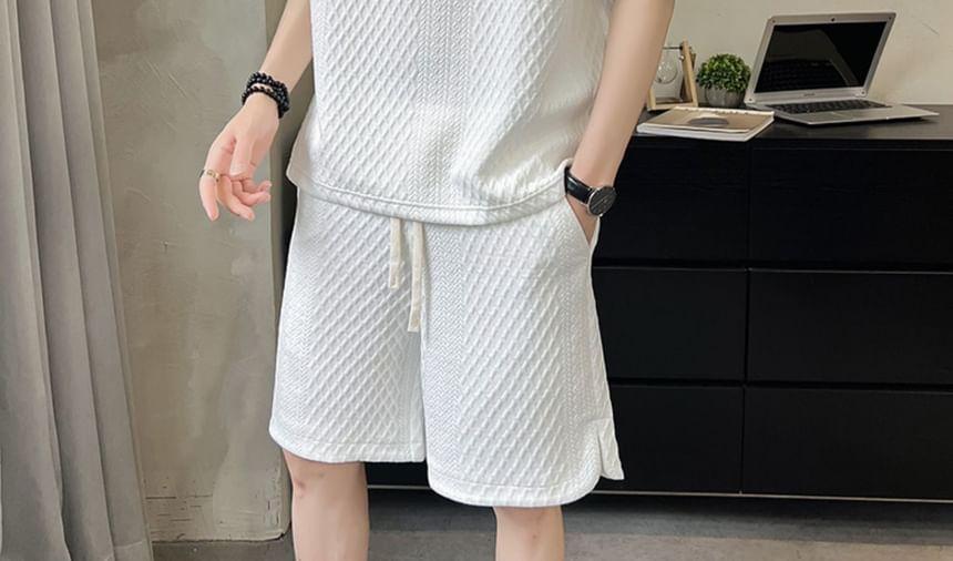 Set: Elbow-Sleeve Plain Textured Half-Zip Polo Shirt + Drawstring Waist Wide Leg Sweat Shorts Product Image