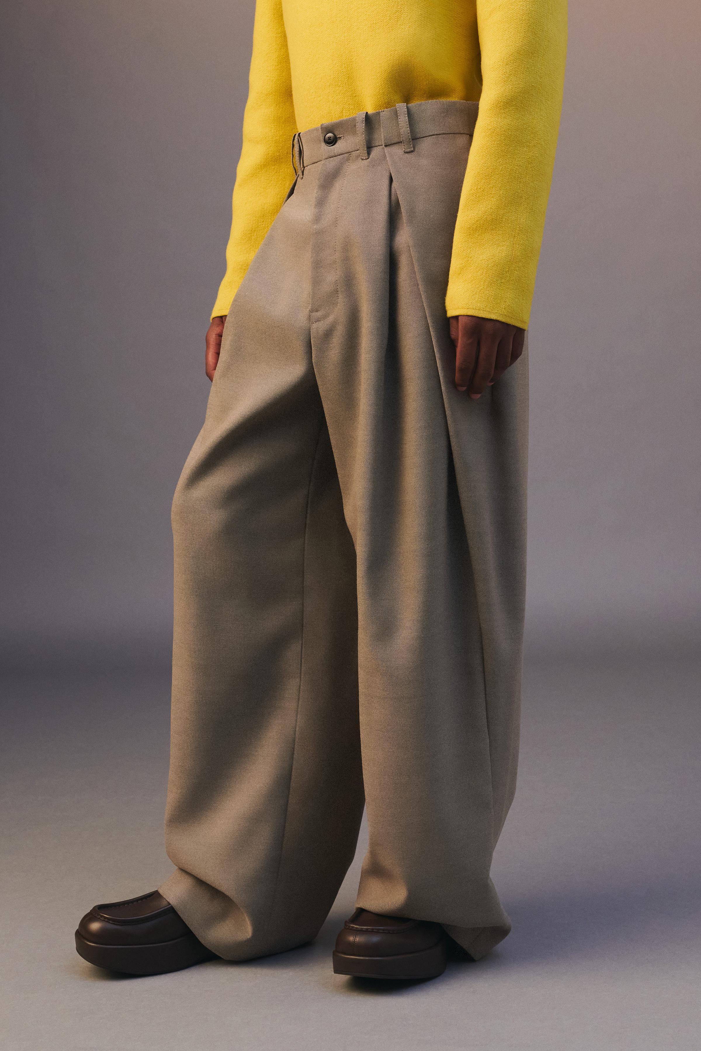 PLEATED WIDE FIT PANTS LIMITED EDITION Product Image